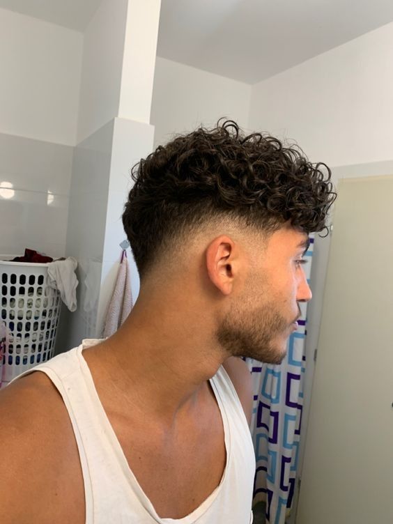 Coupe cheveux homme bouclé